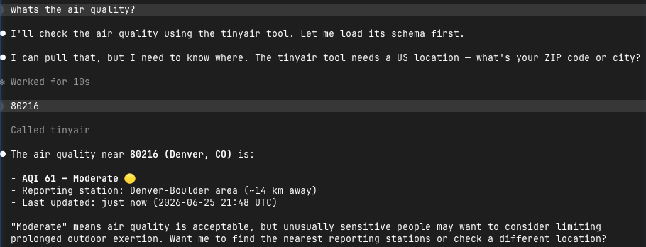 Claude Code terminal: Claude asks for a US ZIP, calls tinyair, and reports zip 80216 Denver at AQI 61 Moderate, station ~14 km away
